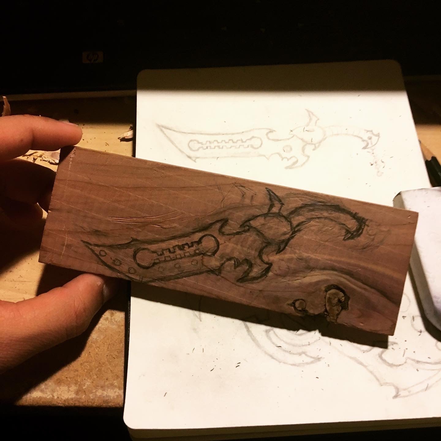 fantasy sword sketch in wood