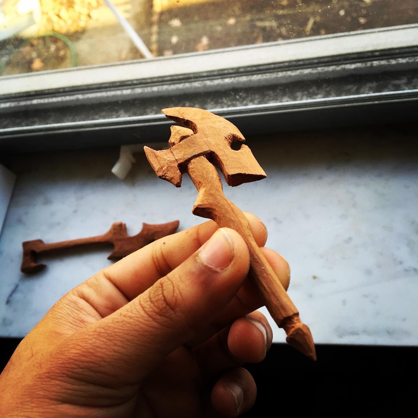 wooden axe carving
