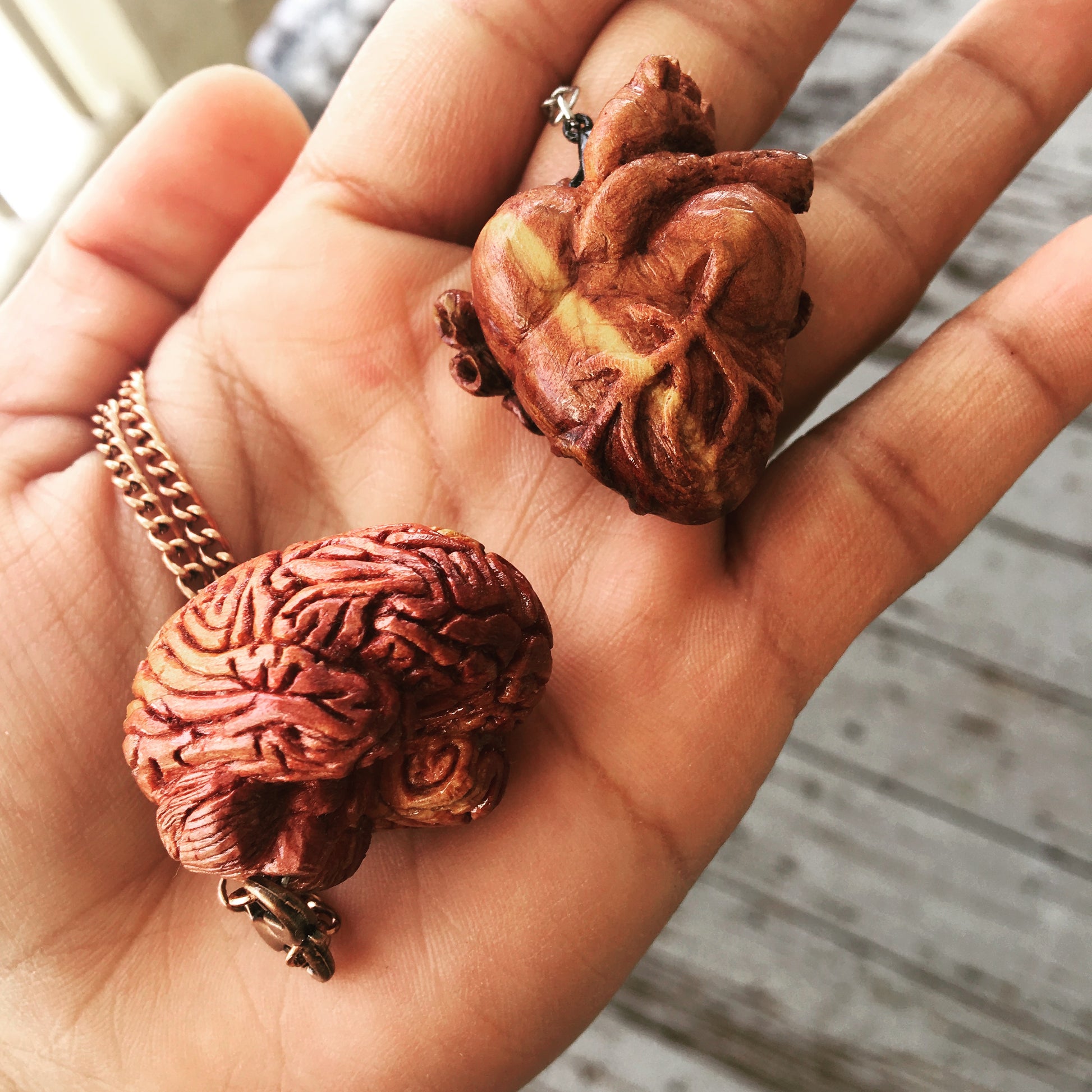 hand carved brain and heart necklace